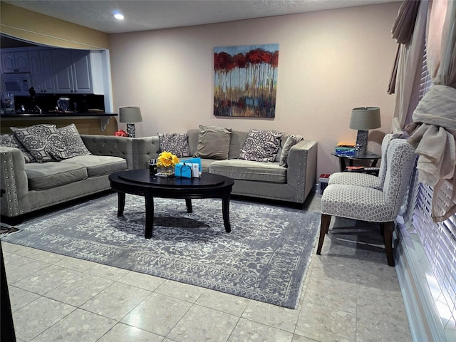 living room featuring light tile patterned floors