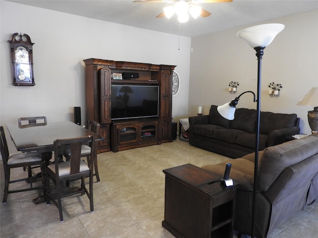 living room featuring ceiling fan and light tile patterned floors