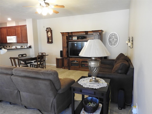 living room featuring ceiling fan