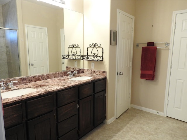 bathroom featuring tile patterned floors and vanity