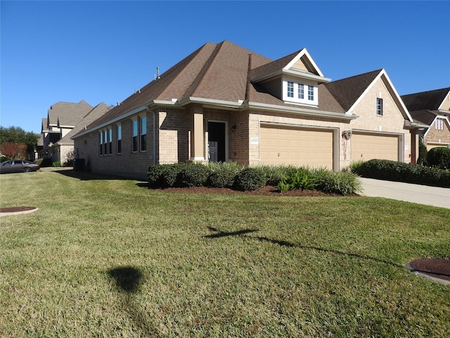 view of front facade with a front lawn and a garage