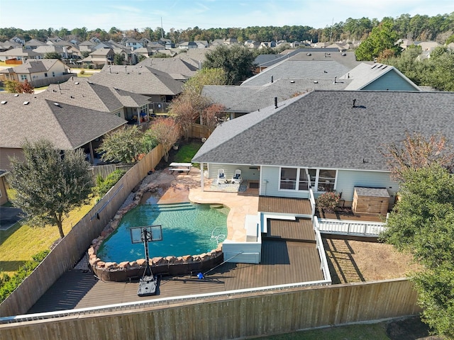 view of pool with a wooden deck