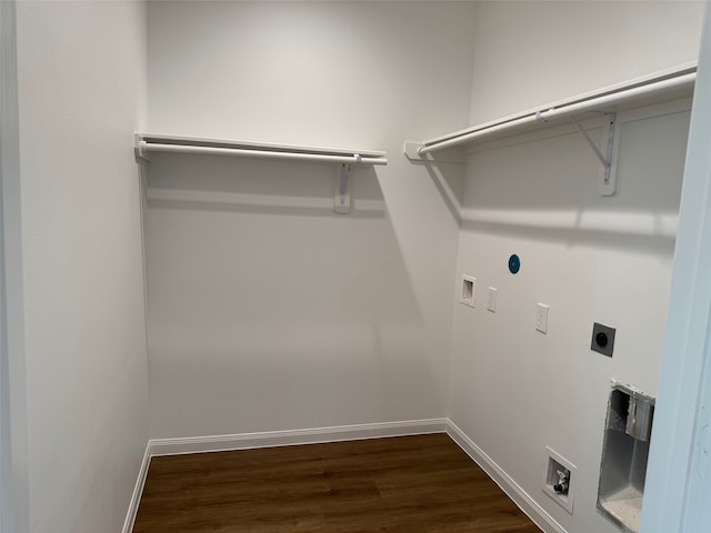 washroom featuring hookup for an electric dryer, washer hookup, and dark hardwood / wood-style flooring