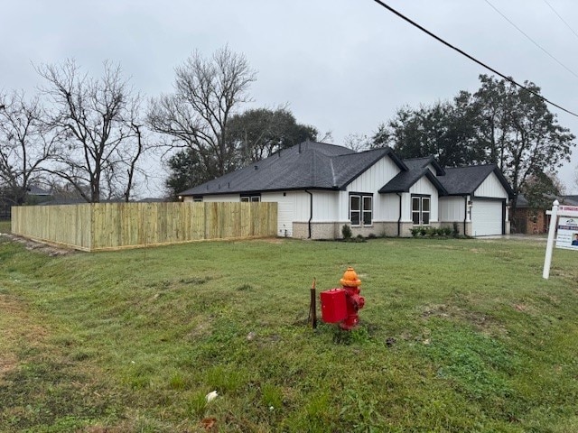 view of yard featuring a garage