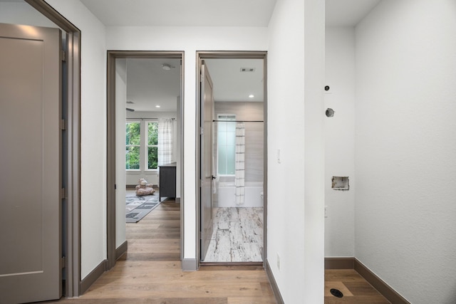 7934 Hennessy Ln Unit 6, Spring, TX 77389 - hallway featuring light wood-style floors and recessed lighting