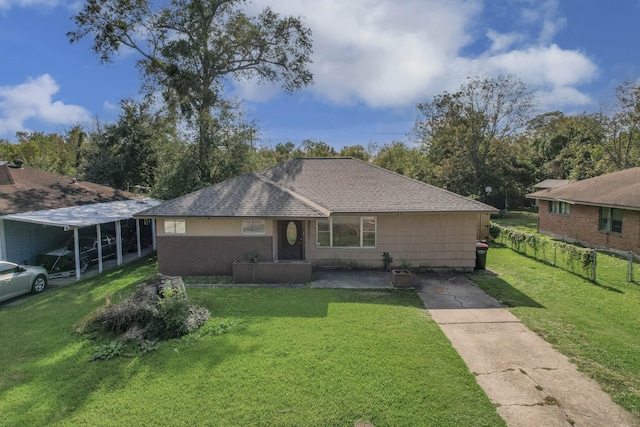 ranch-style home featuring a front yard