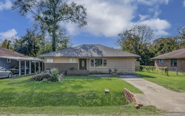 ranch-style home with a front lawn