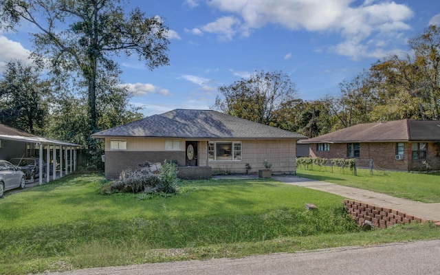 single story home featuring a front yard