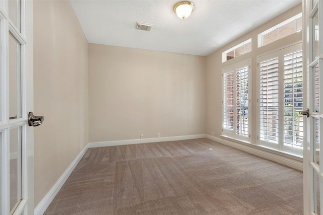 view of carpeted empty room