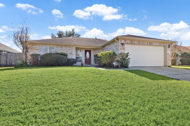 ranch-style home with a front yard and a garage