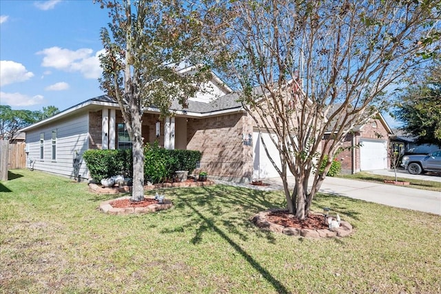 view of front of home with a garage and a front lawn