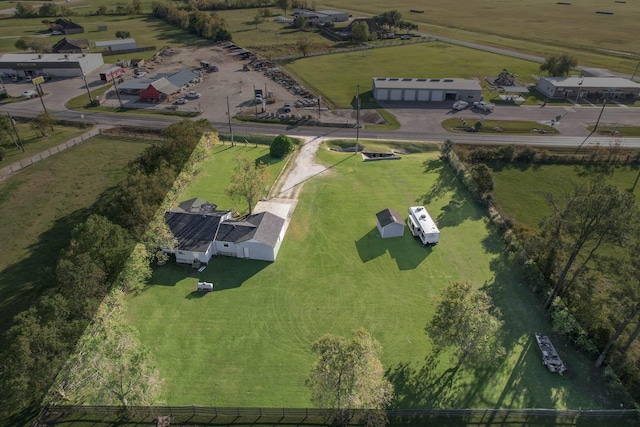 birds eye view of property featuring a rural view