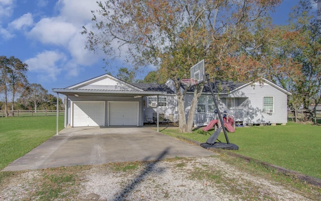 view of front facade featuring a garage and a front yard