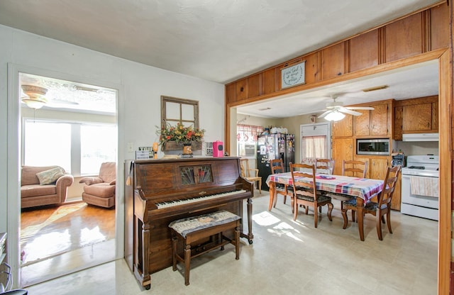 interior space featuring ceiling fan