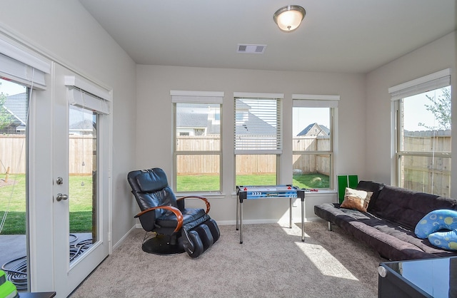 sunroom / solarium with a wealth of natural light