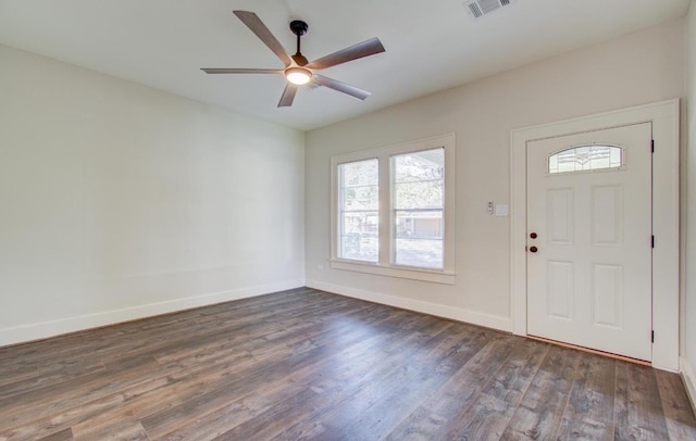 foyer featuring ceiling fan and dark hardwood / wood-style flooring