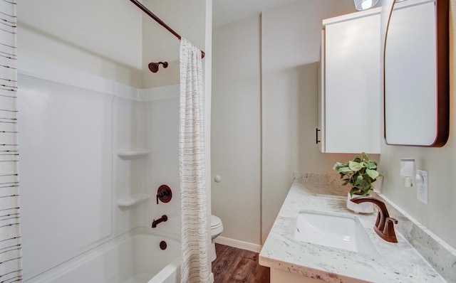 full bathroom featuring toilet, vanity, shower / bath combo, and hardwood / wood-style flooring