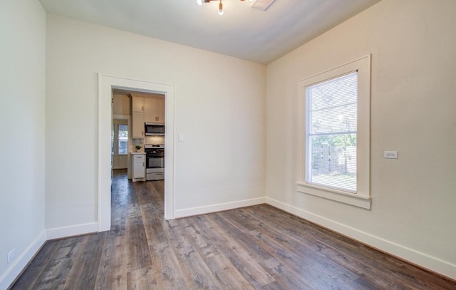 empty room featuring hardwood / wood-style floors