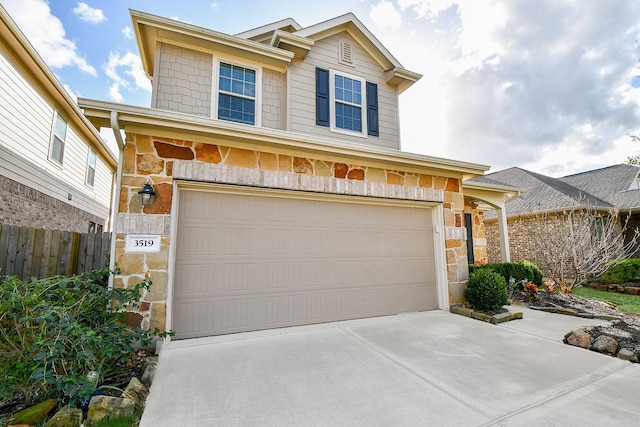 view of front of home with a garage