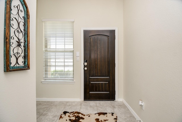 view of tiled foyer entrance