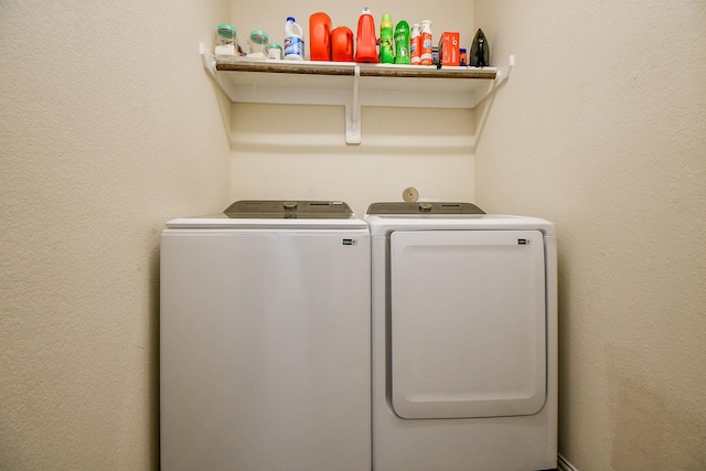 laundry area featuring washing machine and dryer