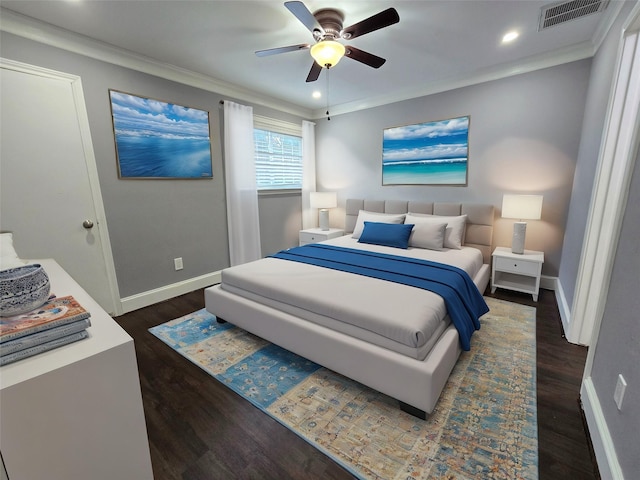 bedroom featuring ceiling fan, crown molding, and dark hardwood / wood-style floors