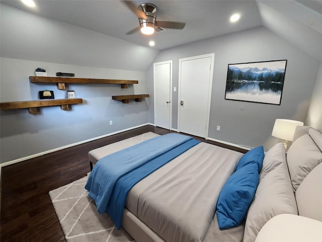 bedroom with ceiling fan, wood-type flooring, and vaulted ceiling