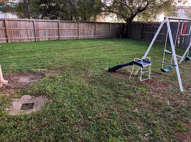 view of yard with a playground