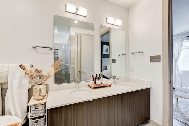 bathroom with vanity and walk in shower