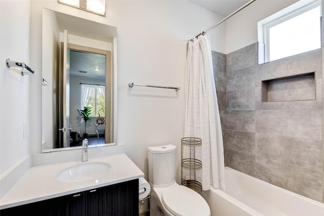 full bathroom with vanity, toilet, and shower / bathtub combination with curtain