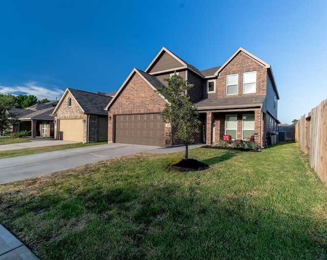 view of front facade with a front yard and a garage