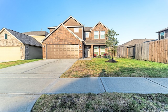 view of front of house featuring a front lawn and a garage