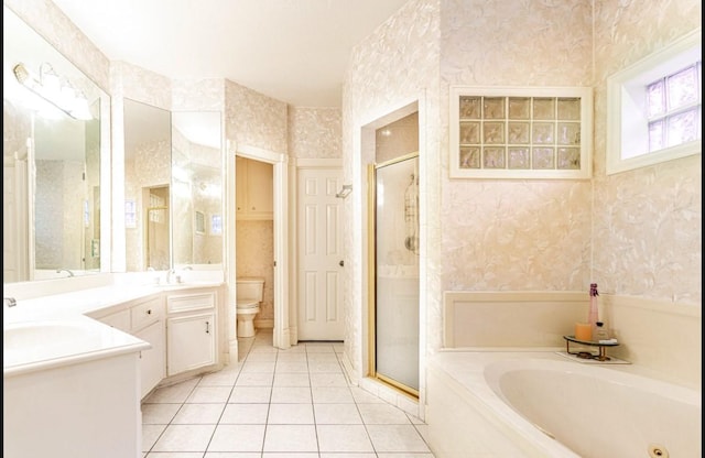 full bathroom with separate shower and tub, tile patterned flooring, vanity, and toilet