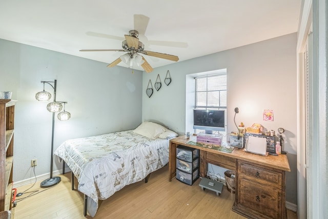 bedroom featuring ceiling fan and light hardwood / wood-style flooring