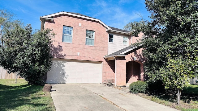 front of property with a garage