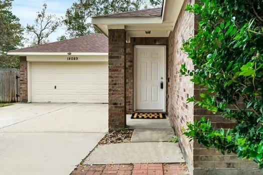 property entrance featuring a garage