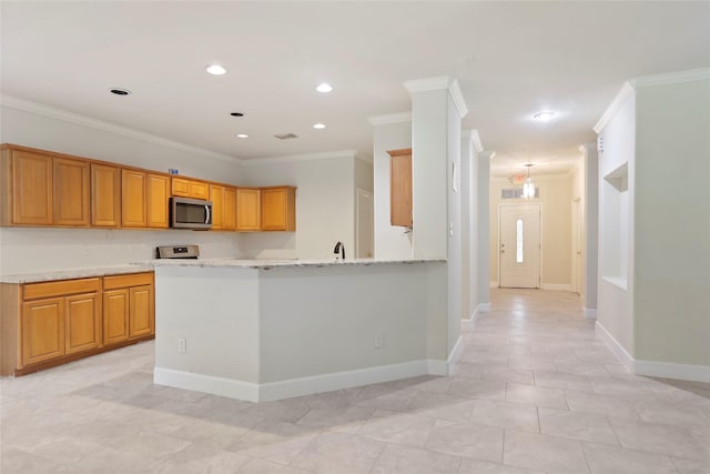 kitchen featuring kitchen peninsula, stainless steel appliances, light stone countertops, and crown molding