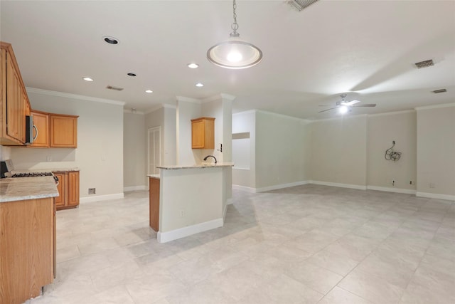 kitchen featuring ceiling fan, light stone countertops, kitchen peninsula, stove, and ornamental molding