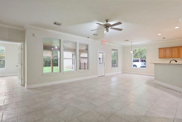 unfurnished living room with light tile patterned floors, ceiling fan, and crown molding