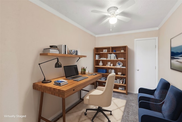 office space with light carpet, ceiling fan, and crown molding