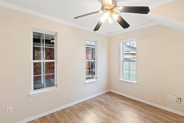 spare room with ceiling fan, light hardwood / wood-style flooring, and ornamental molding