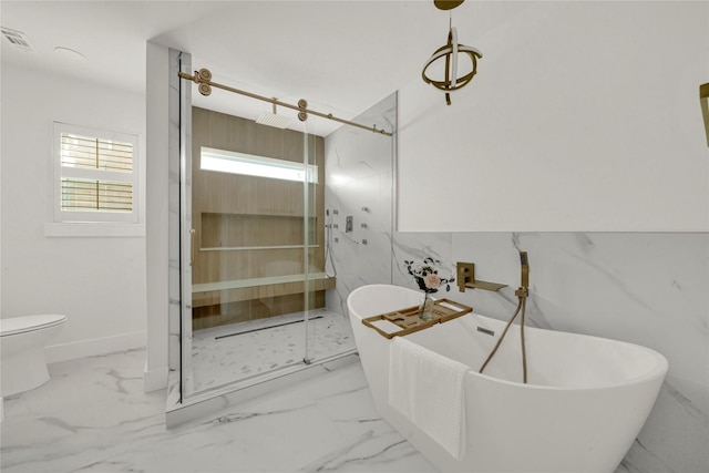 bathroom with separate shower and tub