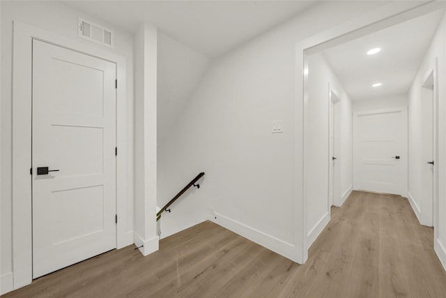 hallway featuring light hardwood / wood-style floors