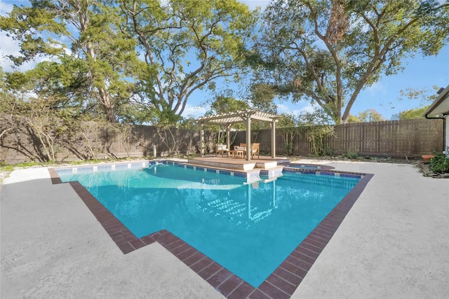 view of swimming pool featuring a pergola, an in ground hot tub, and a patio