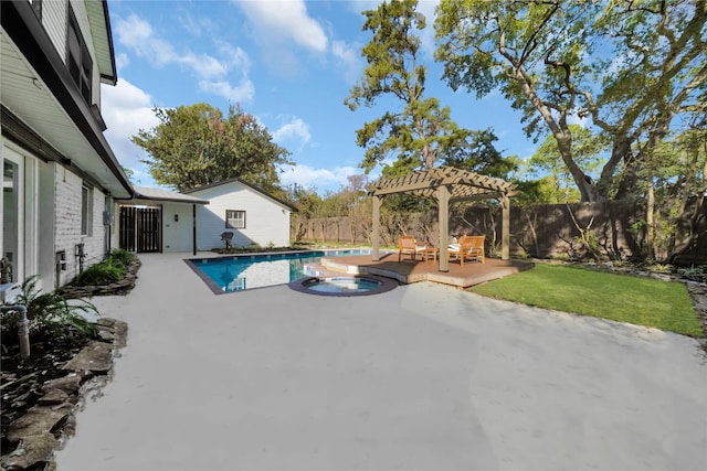 view of patio with a swimming pool with hot tub and a pergola