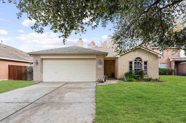 ranch-style home with a garage and a front lawn