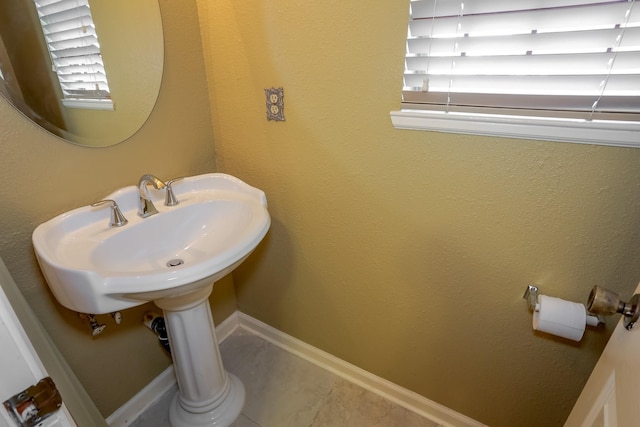 bathroom featuring tile patterned flooring