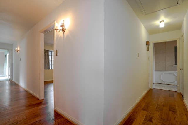 hallway featuring dark hardwood / wood-style floors