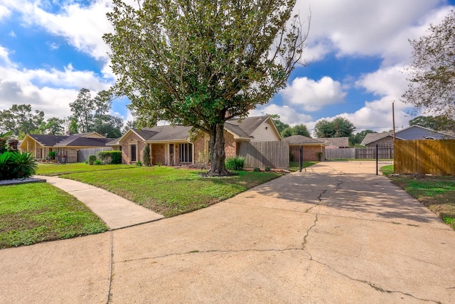 view of front of property with a garage and a front yard