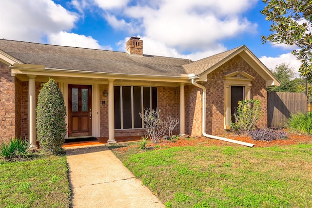 view of front of house with a front lawn